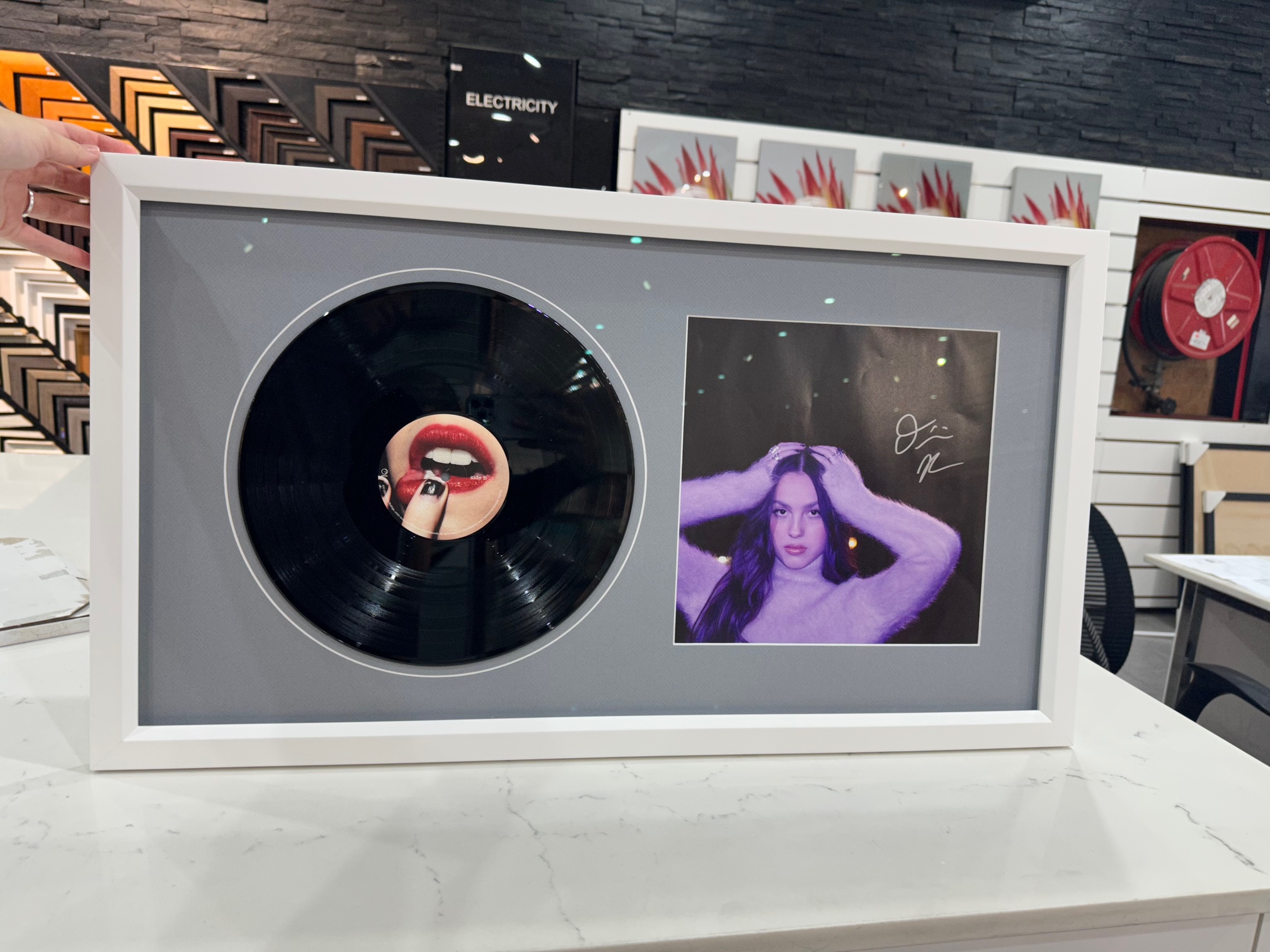 LP and CD framed together with album cover