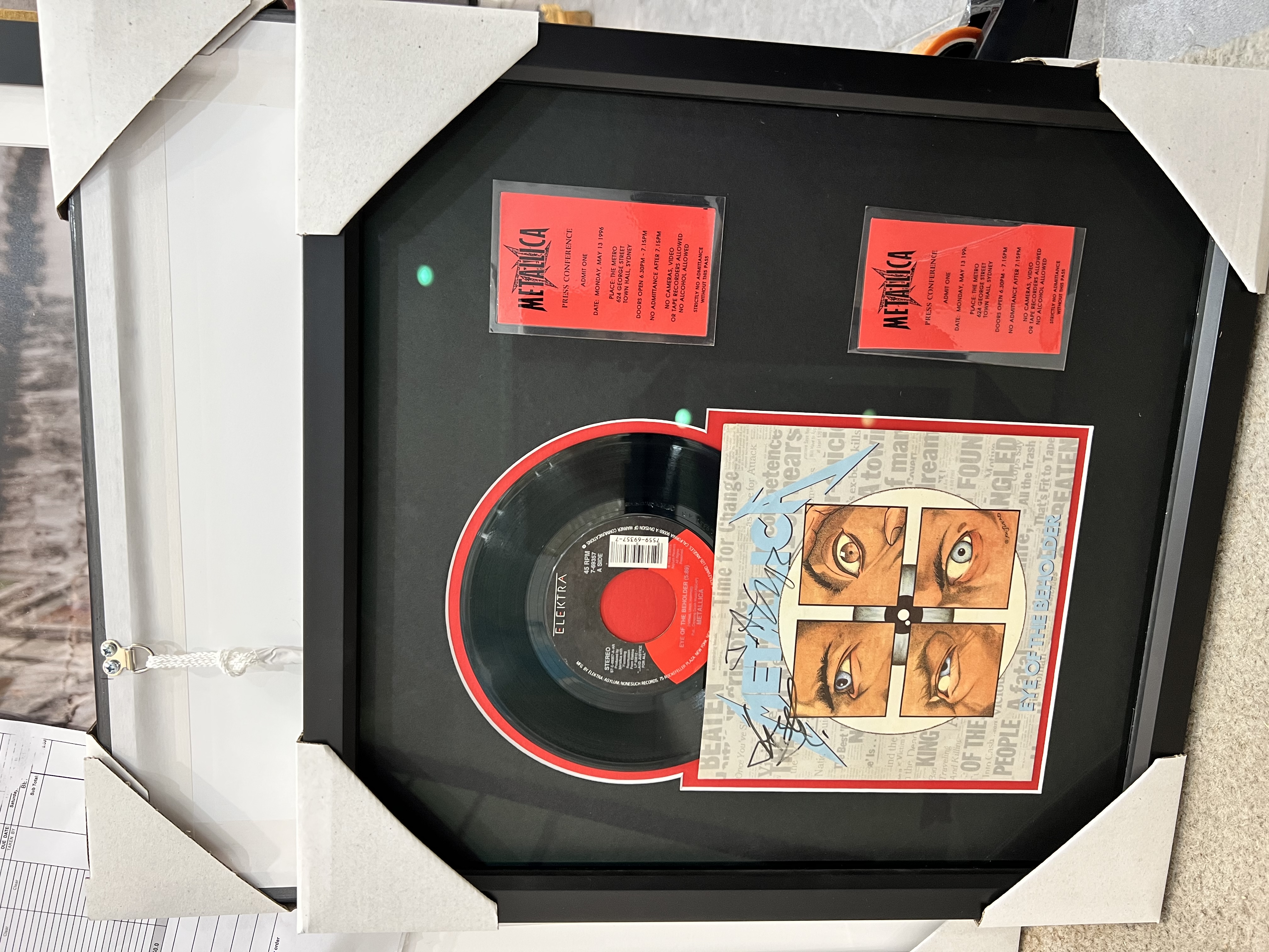 Framed Metallica LP with concert tickets and album art